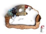 a mirror that has a picture of a horse in it