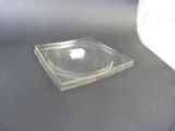 a small square plastic object sitting on a table