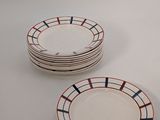 three plates with red, white, and blue stripes are stacked on top of each other