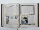 an open book with pictures of people and animals on it