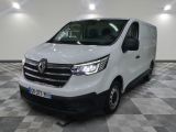 the white van is parked on a checkered floor in a room