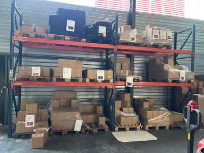 many boxes and boxes on the shelves in the warehouse