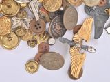 many different types of buttons on a white surface