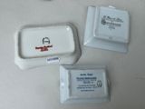 three pieces of soap sitting on a table next to each other