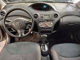 a picture of a car dashboard with a steering wheel