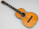 an image of an acoustic guitar with a wooden body and strings