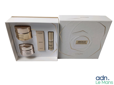 a white box containing a set of skin care products