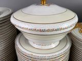 a lot of plates and bowls that are stacked on top of each other