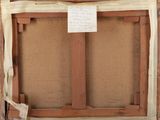 an old picture of a wooden frame with a note attached to it