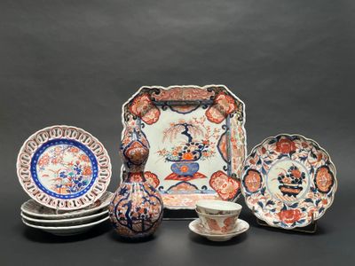 an image of a group of plates and cups on a table