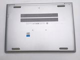 an open laptop computer sitting on top of a white table