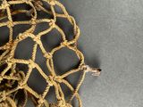 a close up of a rope on a gray surface