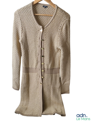 an image of a women ' s cardigan sweater on a hanger
