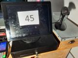 a laptop computer sitting on top of a wooden desk