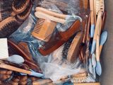 many different types of hair brushes in a box