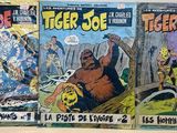 des bandes dessinées « Tiger Joe » exposées sur une table