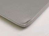 a close up of a silver laptop on a white table