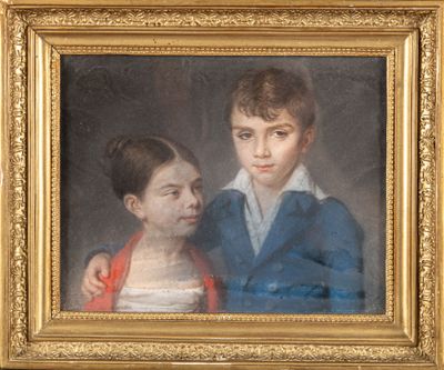 portrait d'un garçon et d'une fille dans un cadre doré
