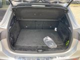 a trunk of a car with a plastic bag in it