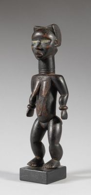 an image of a wooden figure of a woman