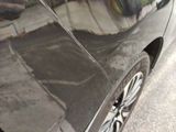 a car that is parked on the side of the street