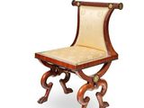 an image of a wooden chair with a leather seat