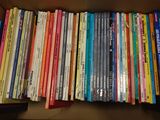 a box full of books sitting on a table