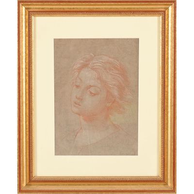 un dessin représentant la tête d'un enfant dans un cadre doré