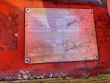 a metal plaque on the side of a red truck
