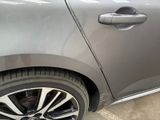 a close up of a car ' s door handle on the side of the car