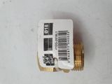 a close up of a gold plated brass fitting on a white surface