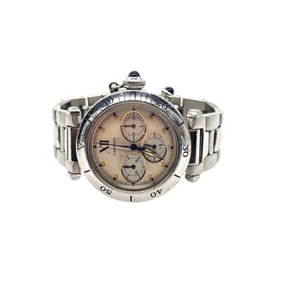 a watch that is sitting on a white surface