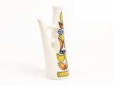 a white vase with a picture of a bird on it