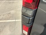 a close up of a car ' s tail lights and tail lights