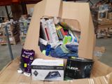 a cardboard box filled with various items in a warehouse