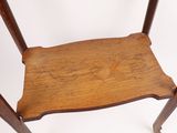 a wooden chair with a wooden seat on a white background