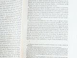 an open book with a picture of a cat on it