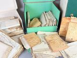 a lot of old books that are sitting on a table