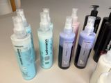 many different types of hair care products on the counter