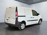 a white van that is parked in a room