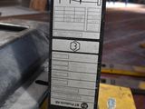 a close up of a fork lift in a warehouse