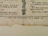 an old book with a picture of a cross on it