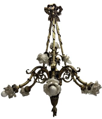 Lustre en bronze patiné doré et ciselé à dix bras de lumière…