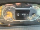 a close up of a car dashboard with a speedometer