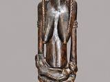 statue of a woman holding a baby in her arms