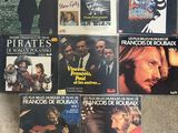 various cd ' s of various music from various countries, including the beatles