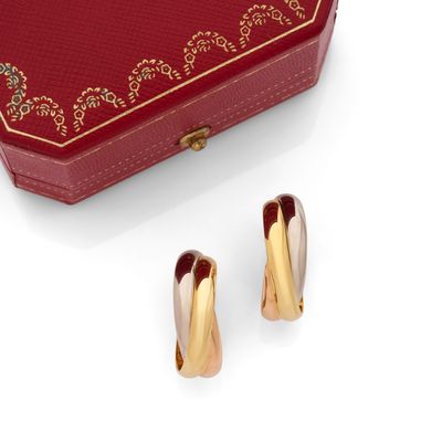 CARTIER CRÉOLES "Trinity" composée de trois anneaux dans les…