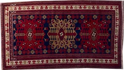 un tapis rouge et bleu sur fond blanc