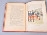 an open book with a picture of a group of people
