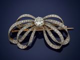 an antique diamond bow broochle